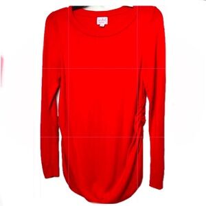 Sweet Christmas red sweater with ruching on each side. Slight hi-low hem